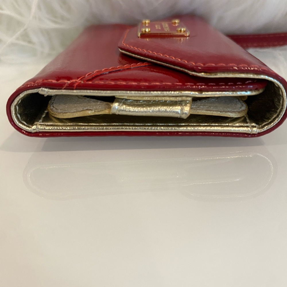 Michael Kors Glossy Red Wristlet with Gold Accents - Picture 3 of 8